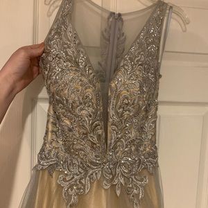 Camille La Vie Prom Dress. Size four. Cream colored dress with silver and shear.